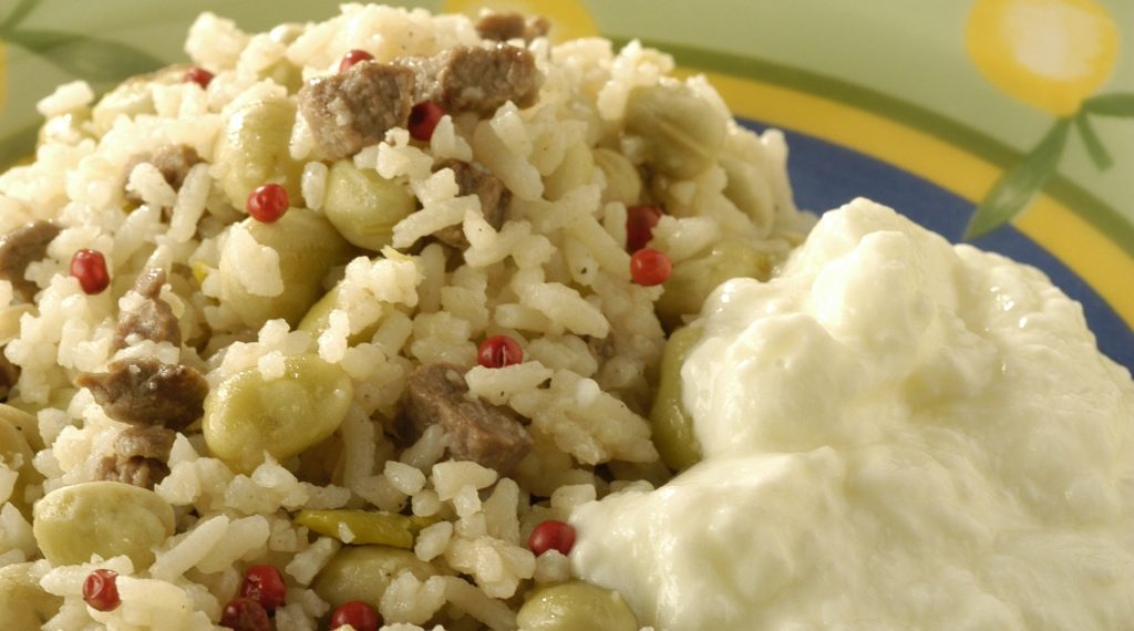 Foto de receita de arroz com fava verde e carne