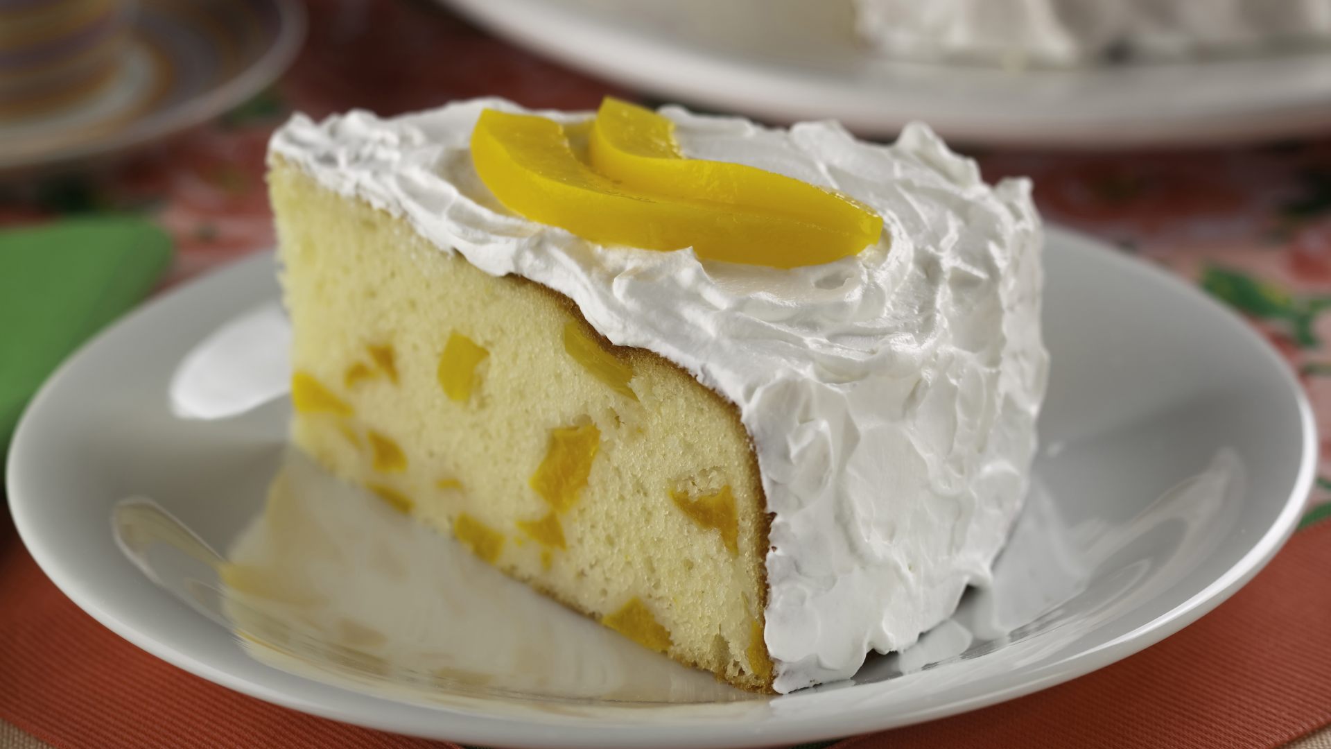 Bolo de pêssego em calda