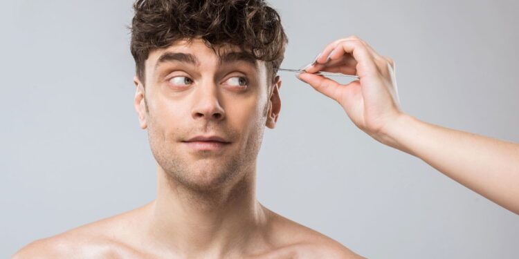 Ilustração de homem com cabelo cacheado volumoso - Créditos: depositphotos.com / AllaSerebrina