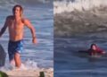 surfista salva mulher de afogamento