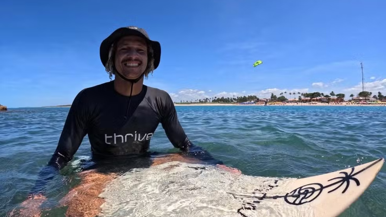 surfista salva mulher de afogamento